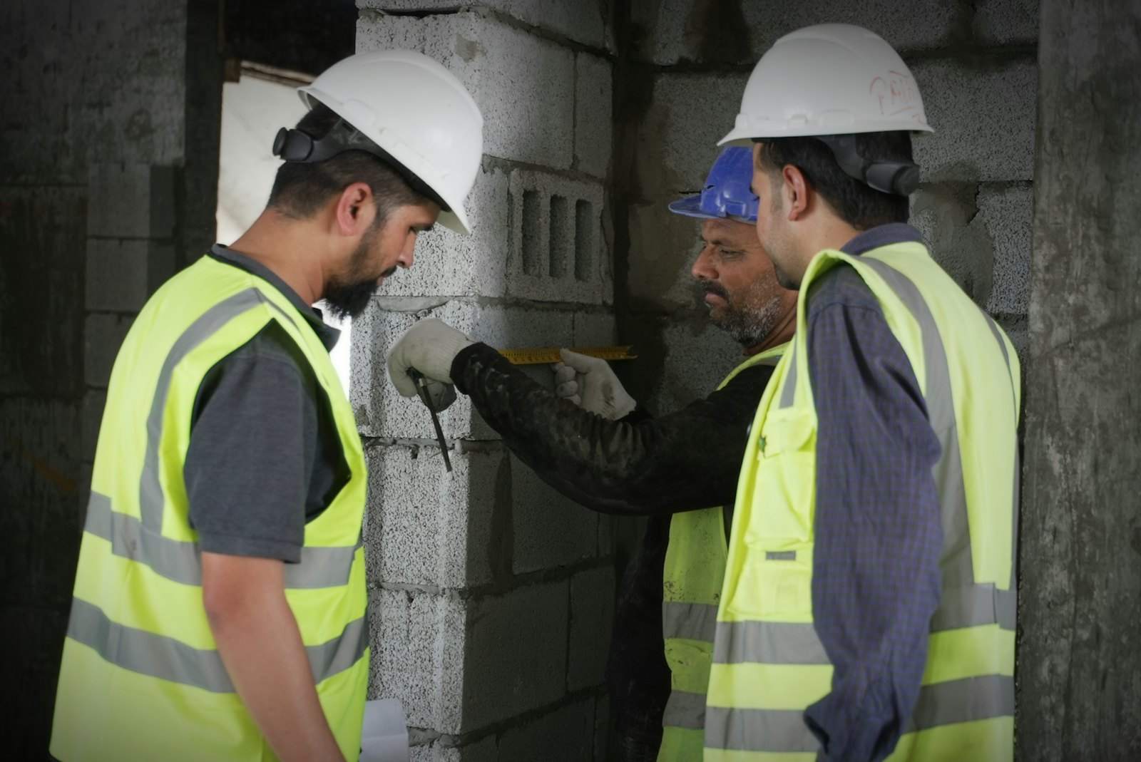 Inspectors checking structural work on a building site